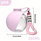 Portable spherical water bottle for pets; features a transparent, drop-resistant design with a lanyard; sealed and leak-proof.